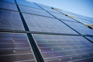 low-angle-view-of-solar-panels-against-sky.jpg